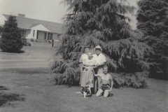 Family by a big tree